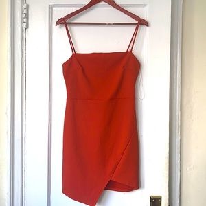 perfect little red cocktail dress with an asymmetric hem